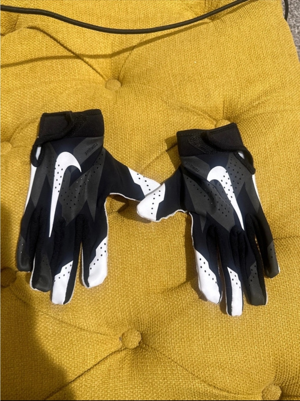 Nike youth medium Black and White football Gloves